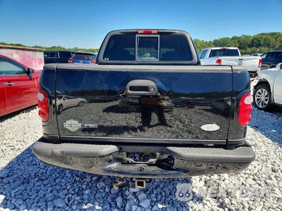 Zdjęcie 6 z 12 samochodu: 2001 FORD F150 SUPERCREW VIN:1FTRW07L11KA40471 - miniatura