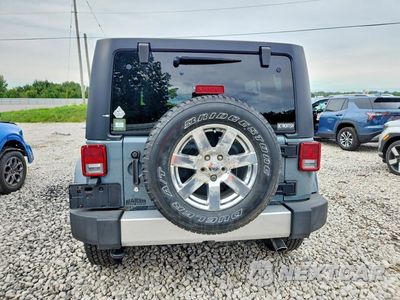 Zdjęcie 6 z 12 samochodu: 2015 JEEP WRANGLER UNLIMITED SAHARA VIN:1C4BJWEGXFL561781 - miniatura