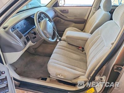 Zdjęcie 7 z 12 samochodu: 1999 TOYOTA AVALON XL VIN:4T1BF18B0XU324910 - miniatura