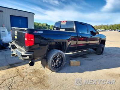 Trzecie zdjęcie samochodu z tyłu: 2015 CHEVROLET SILVERADO K2500 HEAVY DUTY LTZ VIN:1GC1KWE8XFF647365 - miniatura