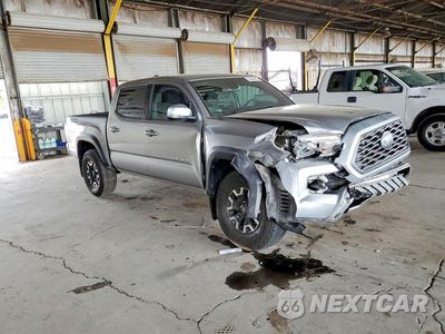 Czwarte zdjęcie samochodu z boku: 2022 TOYOTA TACOMA TRD OFF-ROAD VIN:3TMAZ5CN1NM164778 - miniatura