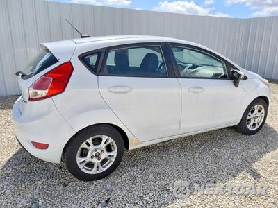 Trzecie zdjęcie samochodu z tyłu: 2014 FORD FIESTA SE VIN:3FADP4EJ9EM118158 - miniatura