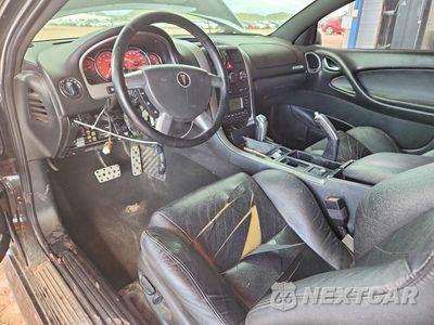 Zdjęcie 8 z 12 samochodu: 2006 PONTIAC GTO VIN:6G2VX12U76L541374 - miniatura