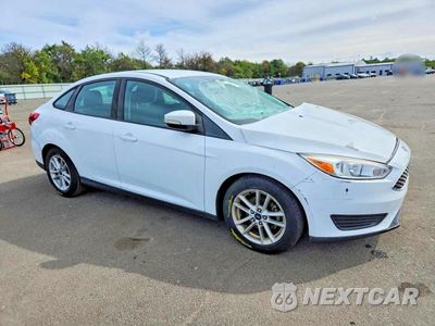 Czwarte zdjęcie samochodu z boku: 2016 FORD FOCUS SE VIN:1FADP3F20GL215142 - miniatura