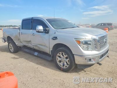 Czwarte zdjęcie samochodu z boku: 2016 NISSAN TITAN XD PLATINUM RE VIN:1N6AA1F27GN510310 - miniatura