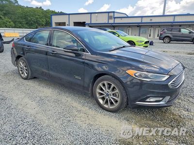 Czwarte zdjęcie samochodu z boku: 2017 FORD FUSION TITANIUM PHEV VIN:3FA6P0SUXHR209706 - miniatura