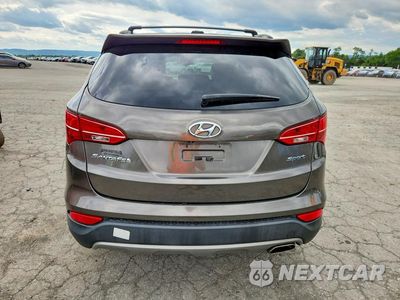 Zdjęcie 6 z 13 samochodu: 2014 HYUNDAI SANTA FE SPORT 2.4L VIN:5XYZU3LB7EG222577 - miniatura