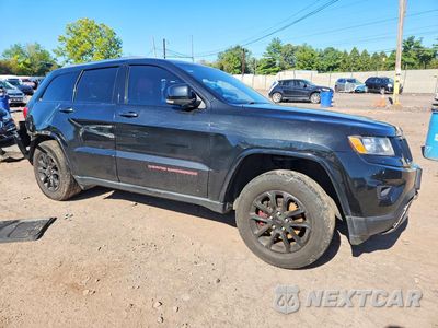 Czwarte zdjęcie samochodu z boku: 2014 JEEP GRAND CHEROKEE LIMITED VIN:1C4RJFBGXEC583958 - miniatura