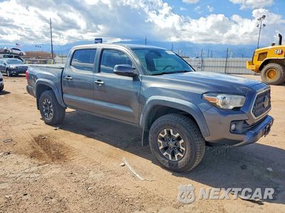 Czwarte zdjęcie samochodu z boku: 2018 TOYOTA TACOMA TRD OFF-ROAD VIN:3TMCZ5AN7JM132052 - miniatura
