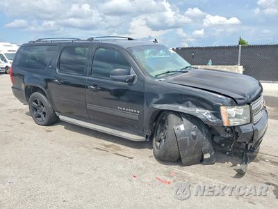 Czwarte zdjęcie samochodu z boku: 2013 CHEVROLET SUBURBAN C1500 LT VIN:1GNSCJE08DR317550 - miniatura
