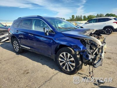 Czwarte zdjęcie samochodu z boku: 2017 SUBARU OUTBACK TOURING VIN:4S4BSATC5H3433544 - miniatura