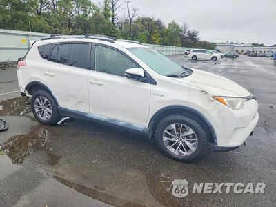 Czwarte zdjęcie samochodu z boku: 2018 TOYOTA RAV4 HYBRID LE VIN:JTMRJREV3JD256740 - miniatura