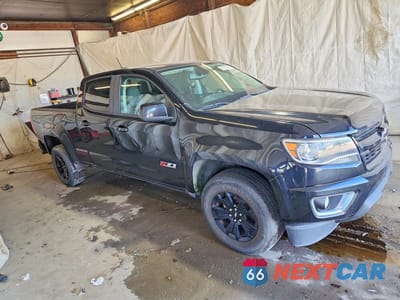 Czwarte zdjęcie samochodu z boku: 2019 CHEVROLET COLORADO Z71 VIN:1GCGTDENXK1143827 - miniatura