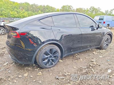 Trzecie zdjęcie samochodu z tyłu: 2021 TESLA MODEL Y VIN:5YJYGAED6MF132560 - miniatura