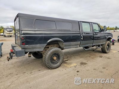 Trzecie zdjęcie samochodu z tyłu: 1995 FORD F350 VIN:1FTJW36F1SEA78616 - miniatura