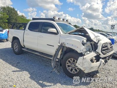 Czwarte zdjęcie samochodu z boku: 2019 TOYOTA TACOMA SR5 V6 VIN:3TMCZ5AN3KM281222 - miniatura
