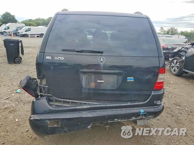 Zdjęcie 6 z 13 samochodu: 2000 MERCEDES-BENZ ML 320 VIN:4JGAB54E2YA173179 - miniatura
