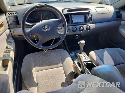 Zdjęcie 8 z 12 samochodu: 2003 TOYOTA CAMRY LE VIN:4T1BE32K13U176915 - miniatura