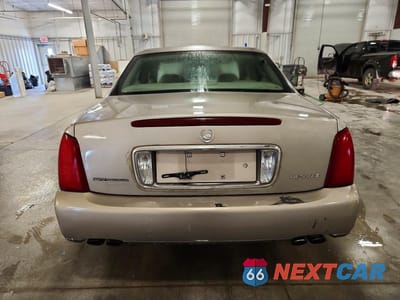 Zdjęcie 6 z 12 samochodu: 2003 CADILLAC DEVILLE VIN:1G6KD54Y03U109567 - miniatura