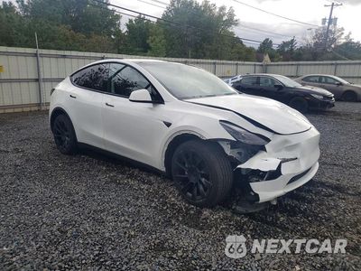 Czwarte zdjęcie samochodu z boku: 2024 TESLA MODEL Y VIN:7SAYGDEE9RA258493 - miniatura