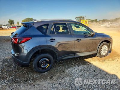 Trzecie zdjęcie samochodu z tyłu: 2014 MAZDA CX-5 TOURING VIN:JM3KE2CY8E0344505 - miniatura