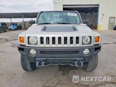 Piąte zdjęcie samochodu w środku: 2009 HUMMER H3 VIN:5GTEN13E598141299 - miniatura