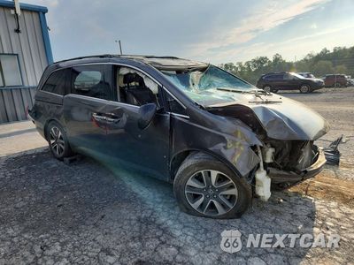 Czwarte zdjęcie samochodu z boku: 2014 HONDA ODYSSEY TOURING VIN:5FNRL5H98EB020231 - miniatura