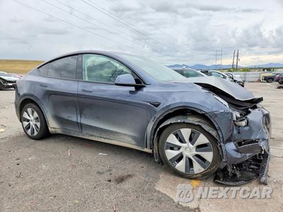 Czwarte zdjęcie samochodu z boku: 2022 TESLA MODEL Y VIN:7SAYGDEE9NF357912 - miniatura