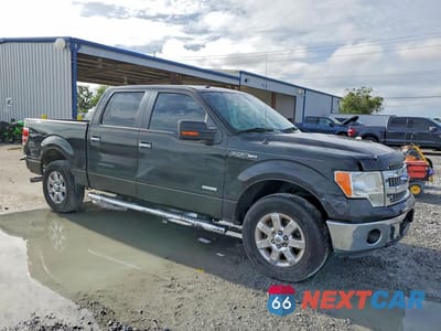 Czwarte zdjęcie samochodu z boku: 2014 FORD F150 SUPERCREW VIN:1FTFW1CT9EFA82383 - miniatura