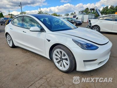 Czwarte zdjęcie samochodu z boku: 2021 TESLA MODEL 3 VIN:5YJ3E1EA3MF928558 - miniatura