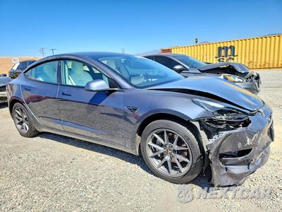 Czwarte zdjęcie samochodu z boku: 2022 TESLA MODEL 3 VIN:5YJ3E1EA1NF354723 - miniatura