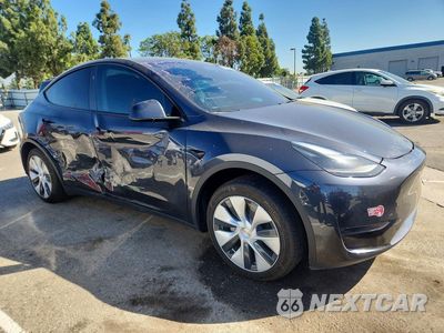 Czwarte zdjęcie samochodu z boku: 2024 TESLA MODEL Y VIN:7SAYGDED1RF055298 - miniatura
