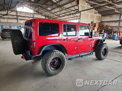 Trzecie zdjęcie samochodu z tyłu: 2012 JEEP WRANGLER UNLIMITED SAHARA VIN:1C4BJWEGXCL188981 - miniatura