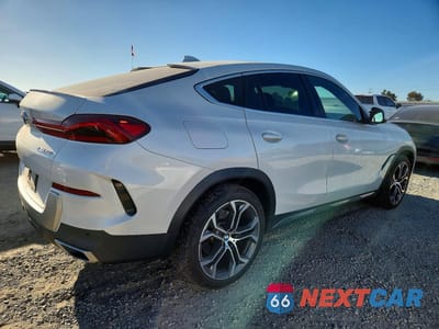 Trzecie zdjęcie samochodu z tyłu: 2021 BMW X6 XDRIVE40I VIN:5UXCY6C08M9D85962 - miniatura