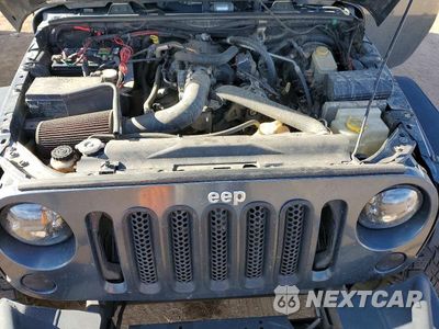 Zdjęcie 12 z 13 samochodu: 2007 JEEP WRANGLER SAHARA VIN:1J4GA591X7L157901 - miniatura