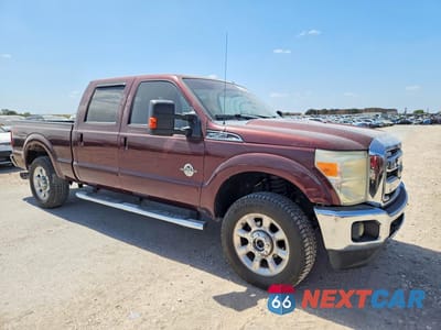 Czwarte zdjęcie samochodu z boku: 2011 FORD F250 SUPER DUTY VIN:1FT7W2BT4BEA06129 - miniatura