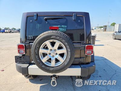 Zdjęcie 6 z 12 samochodu: 2013 JEEP WRANGLER UNLIMITED SAHARA VIN:1C4BJWEG8DL668129 - miniatura