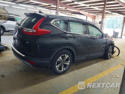 Trzecie zdjęcie samochodu z tyłu: 2019 HONDA CR-V LX VIN:2HKRW5H30KH413804 - miniatura