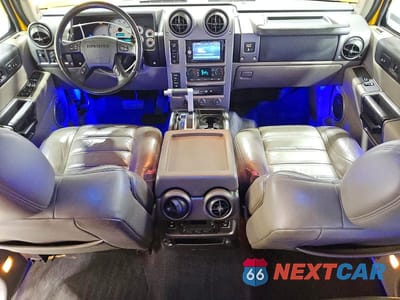 Zdjęcie 8 z 13 samochodu: 2003 HUMMER H2 VIN:5GRGN23U13H146938 - miniatura