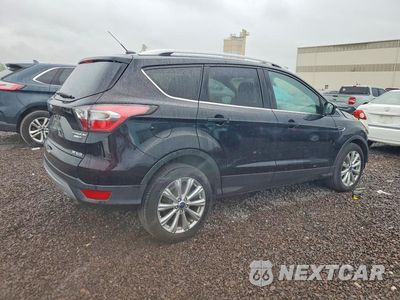 Trzecie zdjęcie samochodu z tyłu: 2017 FORD ESCAPE TITANIUM VIN:1FMCU9JD6HUA04724 - miniatura