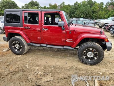 Czwarte zdjęcie samochodu z boku: 2012 JEEP WRANGLER UNLIMITED SPORT VIN:1C4BJWDG0CL142089 - miniatura