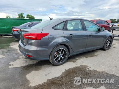 Trzecie zdjęcie samochodu z tyłu: 2017 FORD FOCUS SEL VIN:1FADP3H22HL218817 - miniatura