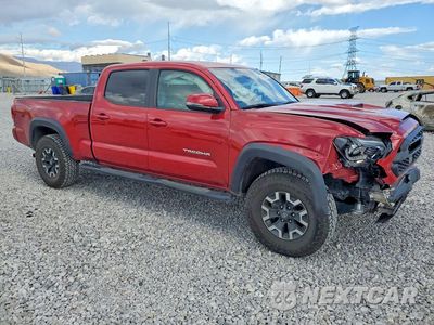 Czwarte zdjęcie samochodu z boku: 2018 TOYOTA TACOMA TRD OFF-ROAD VIN:3TMDZ5BN2JM047820 - miniatura