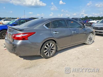 Trzecie zdjęcie samochodu z tyłu: 2017 NISSAN ALTIMA 2.5 SL VIN:1N4AL3AP1HC140003 - miniatura