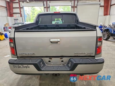Zdjęcie 6 z 12 samochodu: 2013 HONDA RIDGELINE RTS VIN:5FPYK1F43DB003843 - miniatura