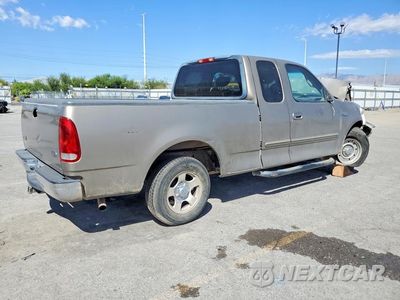 Trzecie zdjęcie samochodu z tyłu: 2001 FORD F150 VIN:1FTZX17281NB87038 - miniatura
