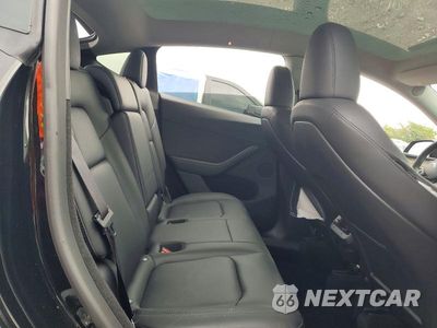 Zdjęcie 11 z 13 samochodu: 2024 TESLA MODEL Y VIN:7SAYGDEE8RA265970 - miniatura