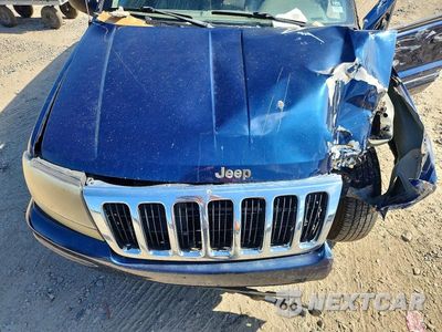 Zdjęcie 12 z 13 samochodu: 2002 JEEP GRAND CHEROKEE LAREDO VIN:1J4GW48N02C275075 - miniatura