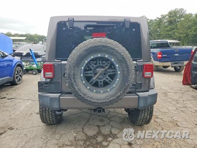Zdjęcie 6 z 12 samochodu: 2017 JEEP WRANGLER UNLIMITED SAHARA VIN:1C4BJWEG2HL507667 - miniatura
