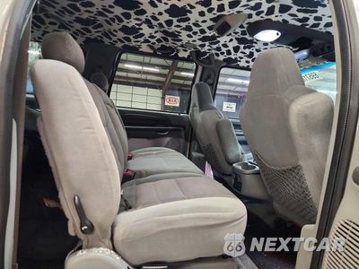 Zdjęcie 11 z 14 samochodu: 2004 FORD EXCURSION XLT VIN:1FMSU41P54ED77914 - miniatura